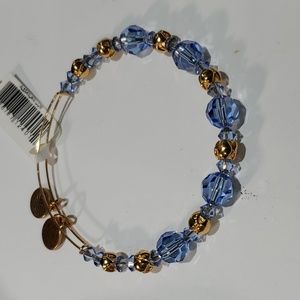 Alex and Ani Periwinkle Blue Rai Swarovski Crystal Beaded Goldtone bracelet.